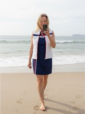 Kinona Navy Golf Set Top with White Quilted Vest and Skort